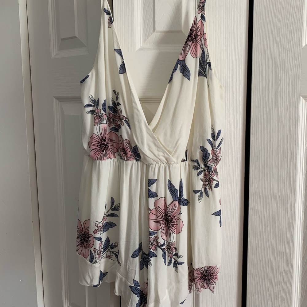 Spaghetti strap low V floral Romper